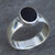 Contemporary 925 silver ring with organic black oval gemstone