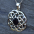 Large Celtic knot silver pendant with hand carved oval organic black gemstone