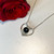 Hand crafted 925 silver open heart pendant with round natural black shiny gemstone