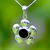 Hand crafted silver buttercup pendant with round Whitby Jet stone