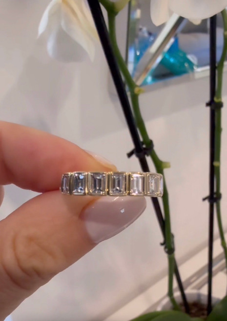 14k Yellow Gold Ring featuring natural Emerald cut Diamonds in a beautiful bezel setting