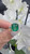 18ct Yellow Gold ring featuring a 3.35 carat Natural Emerald with natural Diamonds each side