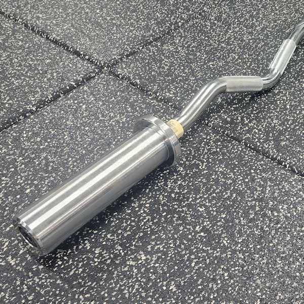 Troy USA Sports Olympic Arm Bar Showing Sleeve on Home Gym Floor