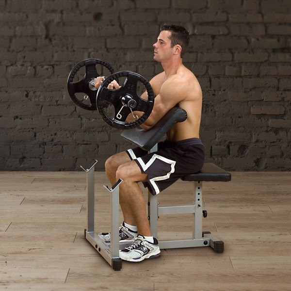 Body-Solid (PPB32X) Powerline Preacher Curl - Man Exercising in Home Fitness Room