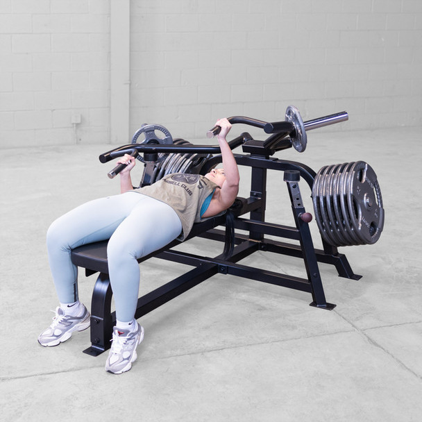 Body-Solid Single-Arm Chest Trainer with Woman Using Unilateral Grip