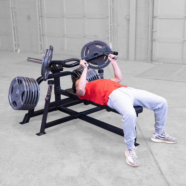 Body-Solid (LVBPB) Leverage Bench Press - Man Using Close Grip Option - Angled View