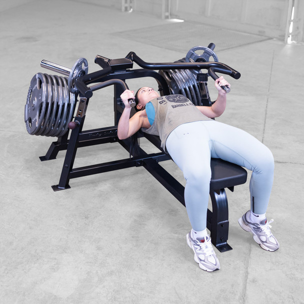 Body-Solid (LVBPB) Leverage Bench Press - Woman Exercising Using Close Grip Option