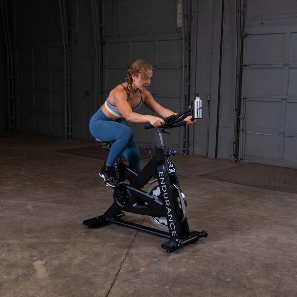 Body-Solid Endurance Indoor Cycle - Woman Exercising on Bike