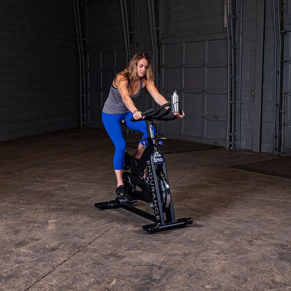 Body-Solid Endurance Indoor Cycle - Female Training on Bike