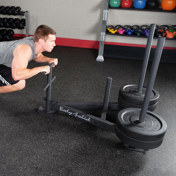 Body-Solid Workout Sled - Man Pushing Sled in Gym