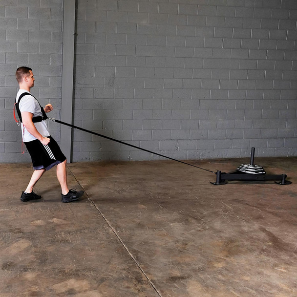 Body-Solid Push/Pull Sled - Man Pulling Sled in Weight Room
