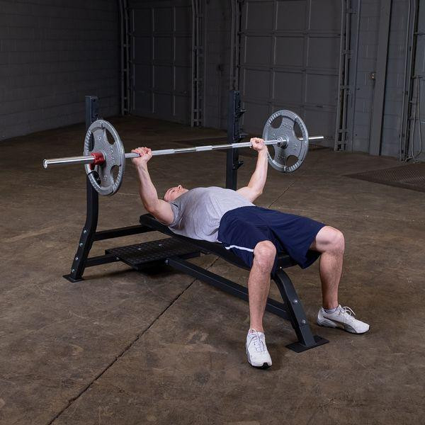 Body-Solid (SOFB250) Olympic Bench Press - Man Exercising w/ Optional Weights