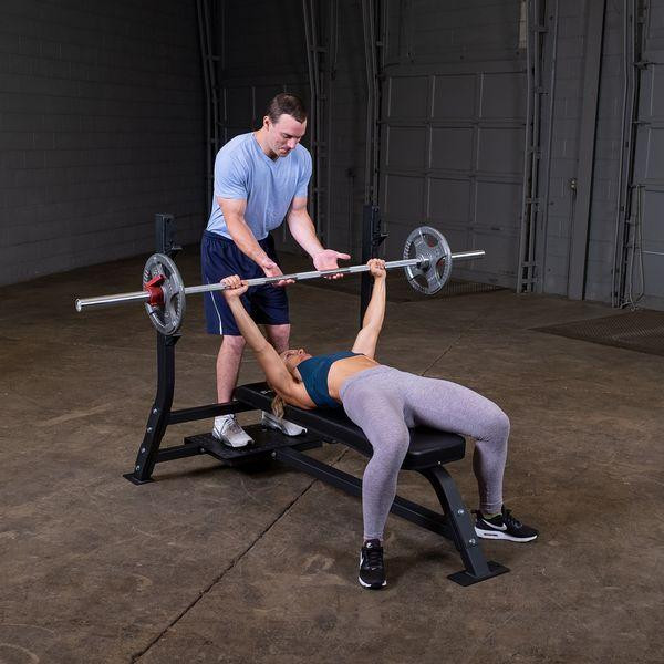 Body-Solid (SOFB250) Olympic Bench Press - Female Exercising w/ Male Spotter