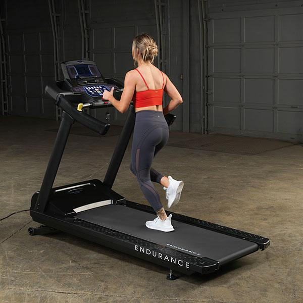 Body-Solid (T150) Endurance Treadmill - Woman Jogging