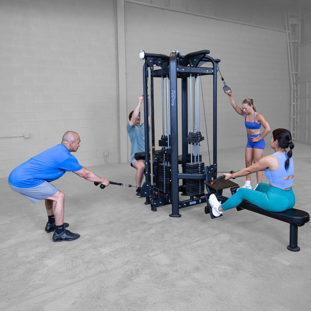 Body-Solid (SJG100) 4-Station Jungle Gym - Users on Commercial Strength Machine