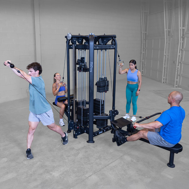 Body-Solid (SJG100) 4-Station Jungle Gym - Users Exercising in Fitness Center