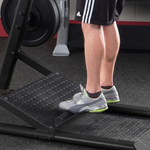 Calf Raise Exercise on Body-Solid Squat Machine