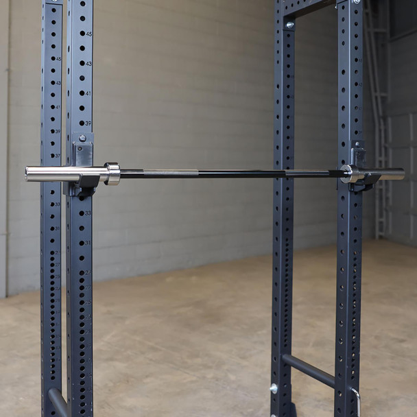 Body-Solid (OB72B) 6' Black Olympic Bar - Pictured on Fitness Rack