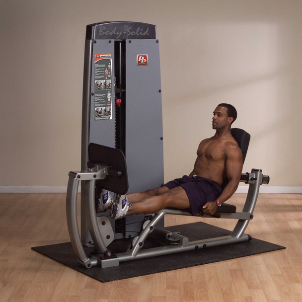 Body-Solid (DCLP-SF) Commercial Seated Leg Press & Calf Machine - Man Exercising