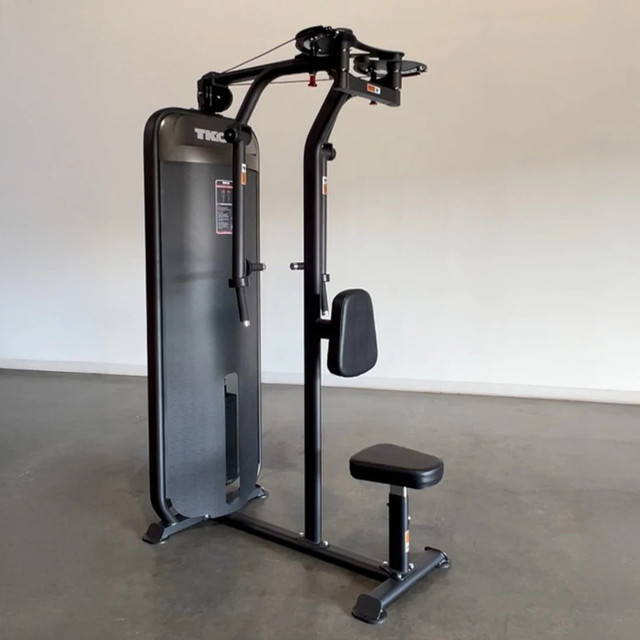 TKO Reverse Fly Exercise Unit with Black Matte Frame in Fitness Room