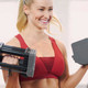 Powerblock Sport 24 Adjustable Dumbbell Set - Woman Working Out at Home