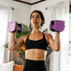 PowerBlock Sport 24 Adjustable Dumbbells - Woman Exercising in Home Gym