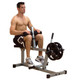 Body-Solid (PSC43X) Powerline Calf Machine - Man Exercising w/ Optional Plates