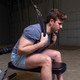 Body-Solid Cable Crunch Strap with Man Training in Home Gym