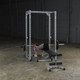 Body-Solid (PPR200X) Powerline Power Rack - Barbell Glute Raise Exercise
