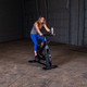 Body-Solid Endurance Indoor Cycle - Female Training on Bike