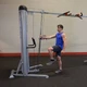 Body-Solid Adjustable Exercise Column During Quadriceps Extension