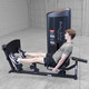 Body-Solid (S2LPCX) Series II Seated Leg Press - Man Exercising Calves