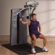 Body-Solid (DPEC-SF) Pec Fly/Rear Delt - Man Showing Independent Arm Movement