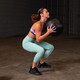 Body-Solid Dynamax Wall Ball - Woman Exercising with Wall Ball