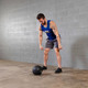 Man Working Out with Body-Solid Slam Exercise Ball