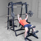 Man Exercising on Body-Solid Smith Press Package