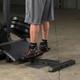 Standing Calf Exercise on Body-Solid Squatting Machine