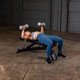 Body-Solid (SFID325B) Clubline Adjustable Bench - Woman Exercising in Flat Position