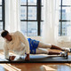 Aeromat Folding Exercise Mat - Man Exercising on Mat in Fitness Studio