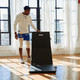 Aeromat Cushioned Floor Mat Being Unfolded on Studio Floor
