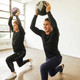 Aeromat Deluxe Rubber Medicine Balls - Lower Body Lunge Exercise in Fitness Studio