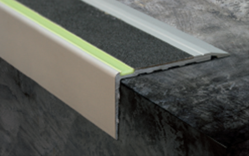 Glow-in-the-dark outdoor stair nosing installed on fire exit steps