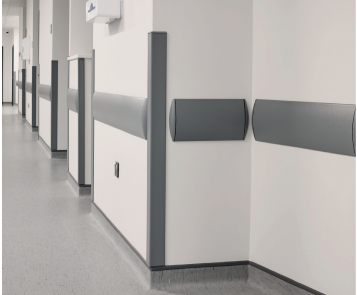 PVC-u corner guard with aluminium retainer in hospital corridor