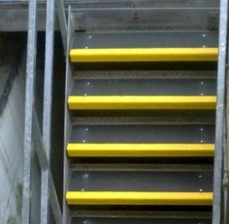 GRP stair tread cover at fire exit