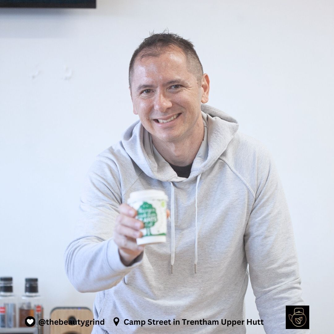 Stephen Beath serving a double shot flat white at the Beauty Grind in Upper Hutt