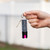 Close-up of twist lock safety and keyring attachment on Police Magnum 1/2oz pepper spray keychain