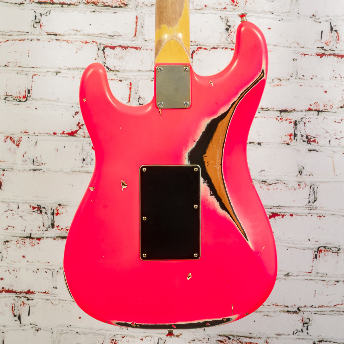 hot pink and black guitar