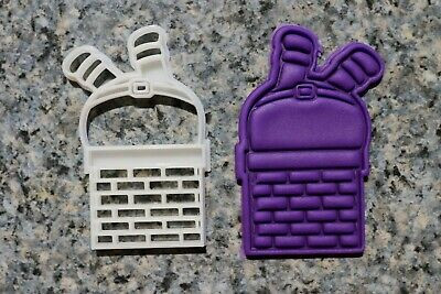 Santa stuck in chimney cutter and embosser