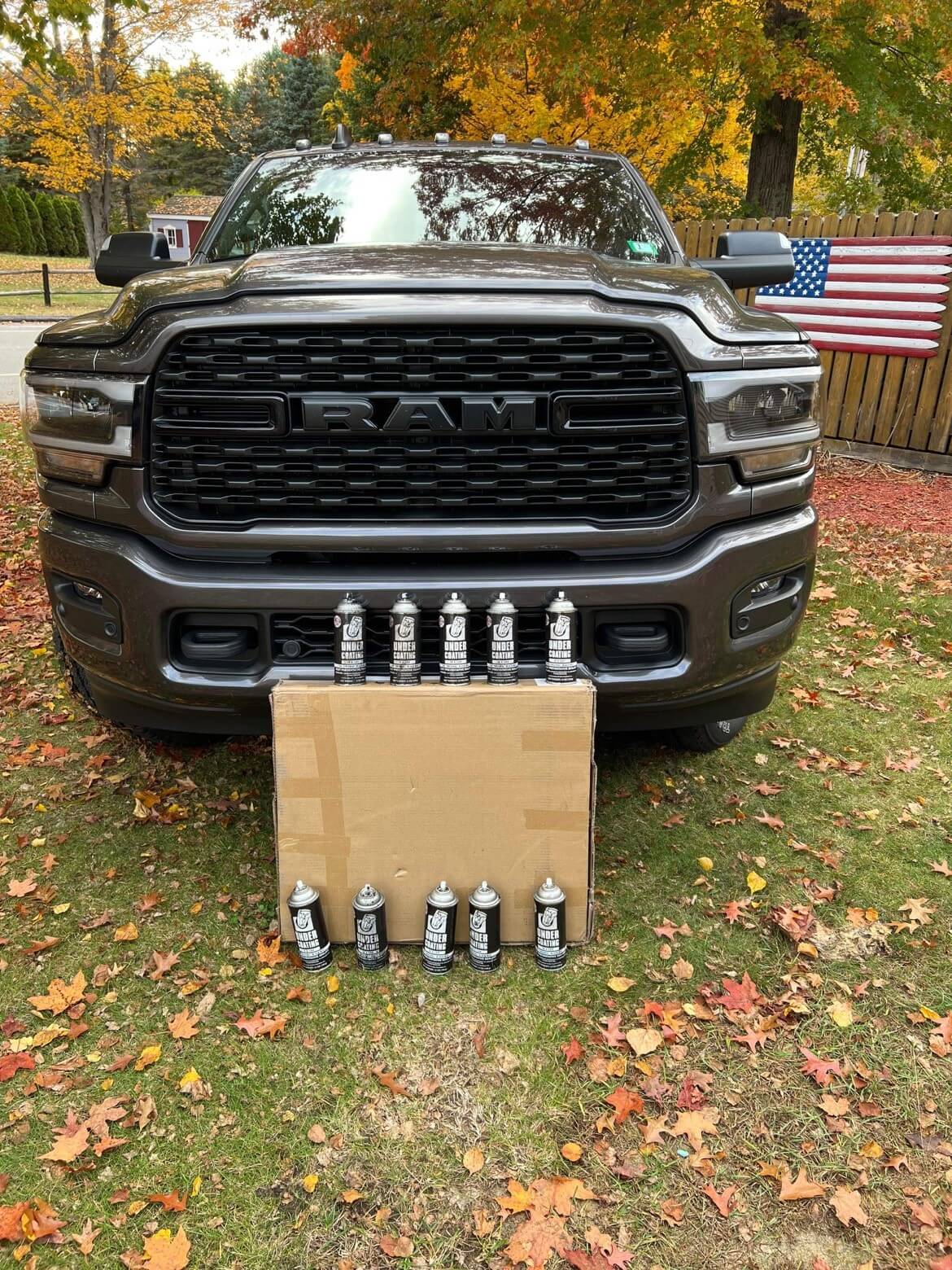 Ram 2500 with Case of Black Wax Undercoating in a Can