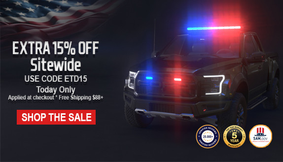 LED emergency vehicle lights on a black police truck with red and blue flashing led light bar, led visor light, and led grille and surface mount strobe lights, showcasing Extreme Tactical Dynamics warning lights at night.